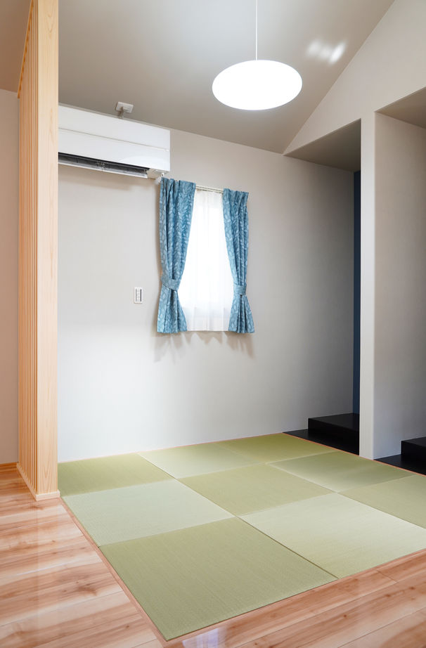 千里殖産 グレーの外観でまとまったスタイリッシュモダンハウスの建築実例画像4