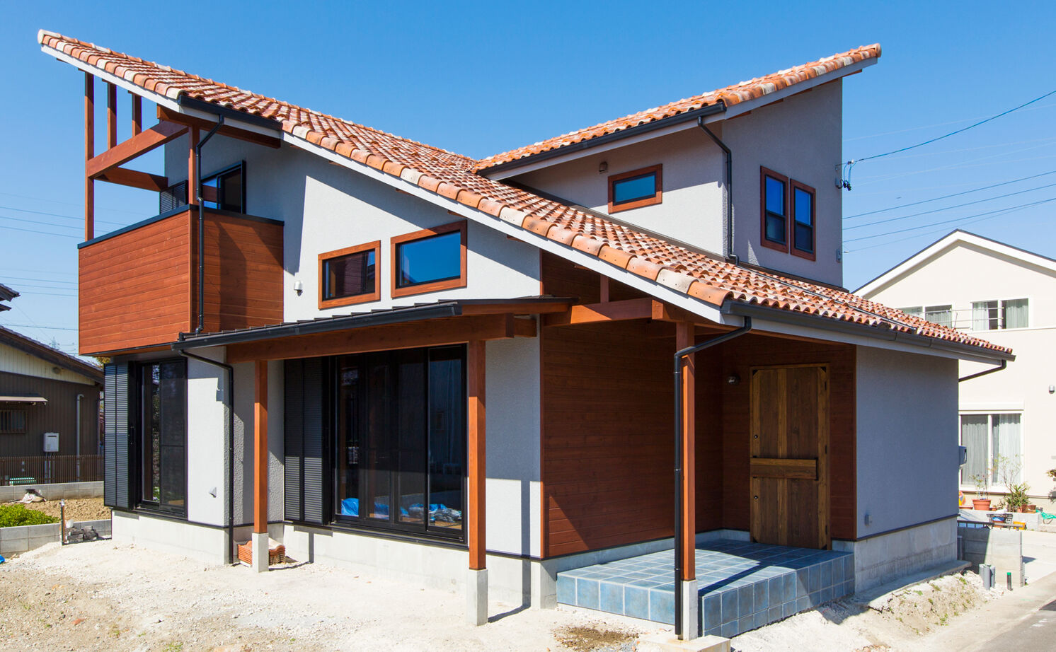 大政建築 【岐阜市/30坪台の間取り】素材や色使いで自分らしく。ビストロ風キッチンで腕を振るう毎日の建築実例画像2