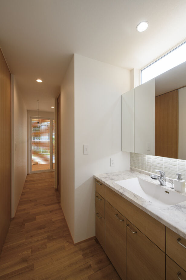 大政建築 【2000万円台/平屋/コの字型の間取り】外からの目を気にせずのびのび過ごせる中庭が開放感を届ける平屋建ての建築実例画像11