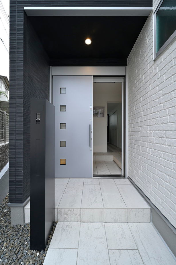 １００年住宅のゼロホーム 1000万円台・枚方市｜高低差を生かし多彩な空間を創り出したモノトーンの美しい家｜間取り有の建築実例画像9