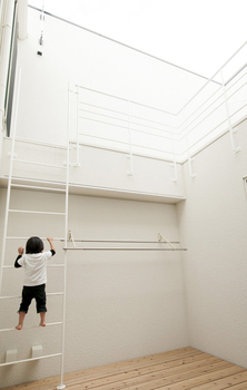 宮崎工務店 【コの字型×外観×平屋風】オープンキッチンの楽しい我が家。中庭でアウトドアを愉しむシンプルモダンの家の建築実例画像5