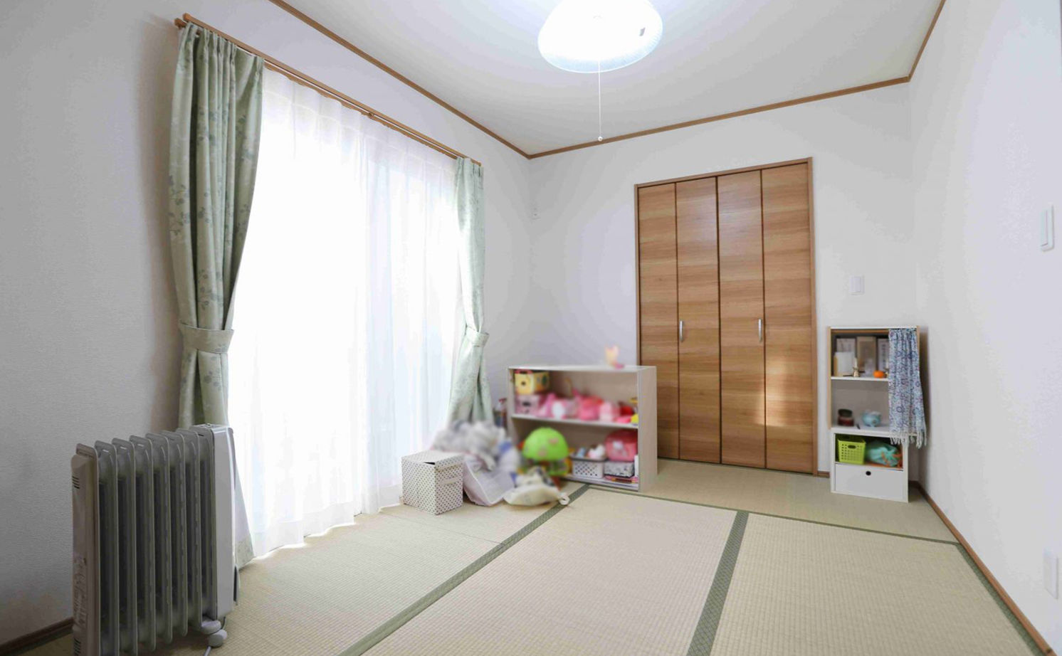 アイダ設計 【間取り図有/30坪台/小屋裏収納/バルコニー】空間を有効活用した、人目を気にしない裏庭のある家の建築実例画像4