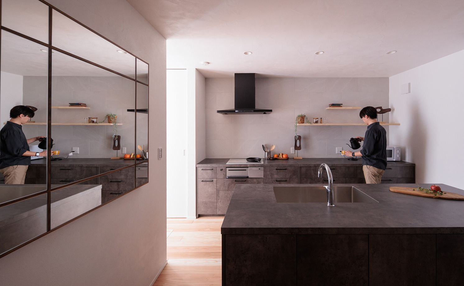 エーセンス建築設計 【2000万円台/36.9坪】北側ファサードから光を入れ、緑を眺める。デザインにこだわったセンスのいい家の建築実例画像6