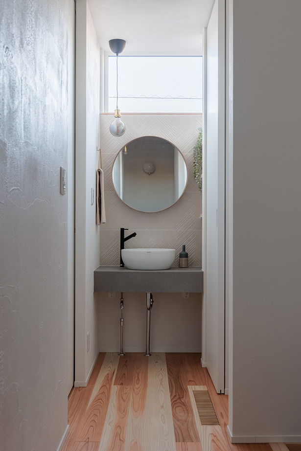 エーセンス建築設計 【2000万円台/36.9坪】北側ファサードから光を入れ、緑を眺める。デザインにこだわったセンスのいい家の建築実例画像8