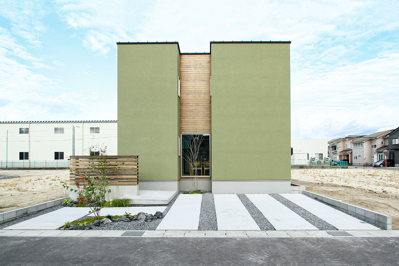 ハーバーハウス 家族の時間を楽しむモスグリーンの塗り壁の家の建築実例画像1