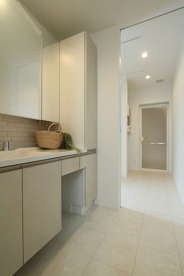 ハーバーハウス 木格子の勾配天井とモノトーンインテリアが魅せる、広い2階リビングの家の建築実例画像7