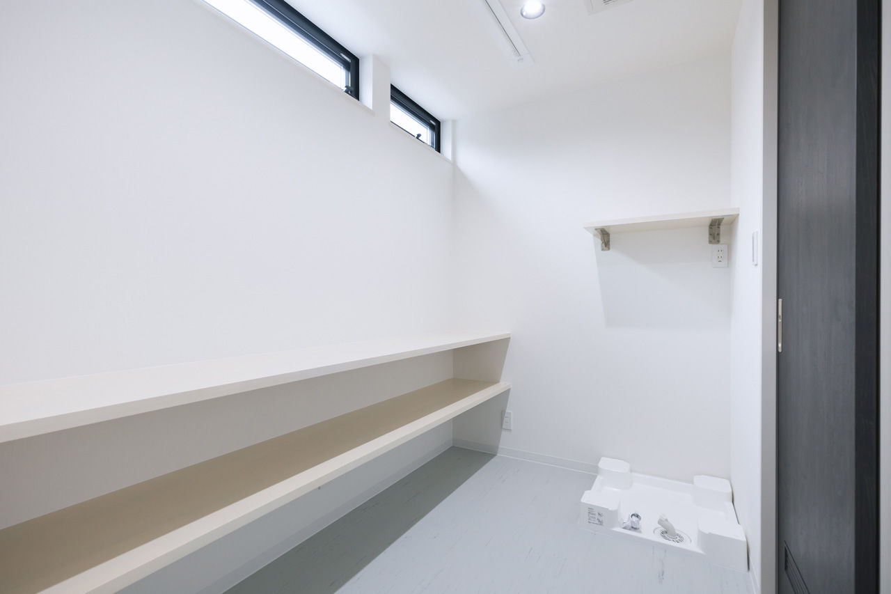 夢広 【2000万円台/ビルトインガレージ】建築家のアイデアで道路面は窓が少なく、室内は光いっぱいの都市型住宅の建築実例画像9