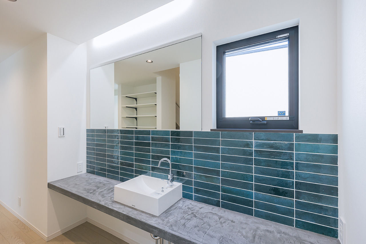 夢広 【2000万円台/ビルトインガレージ】建築家のアイデアで道路面は窓が少なく、室内は光いっぱいの都市型住宅の建築実例画像10