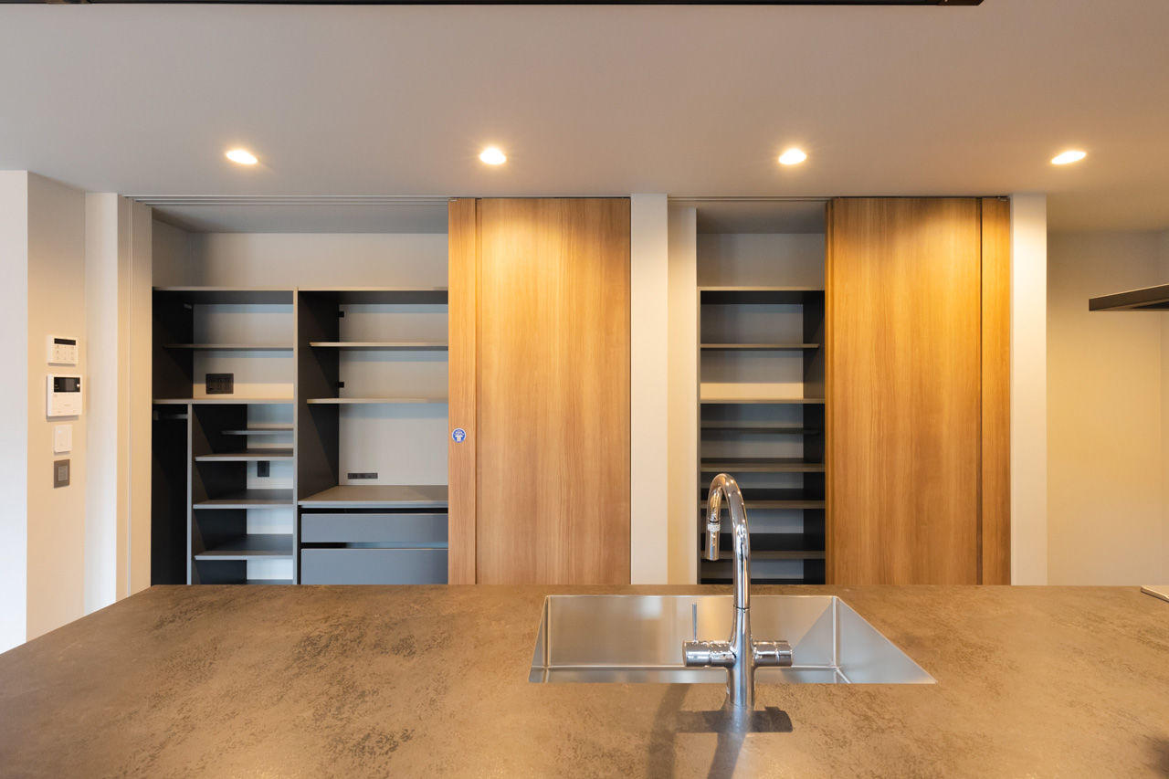 夢広 ６人家族を支える大きなランドリールームが魅力的。スキップフロアでつながる開放的な住まいの建築実例画像6