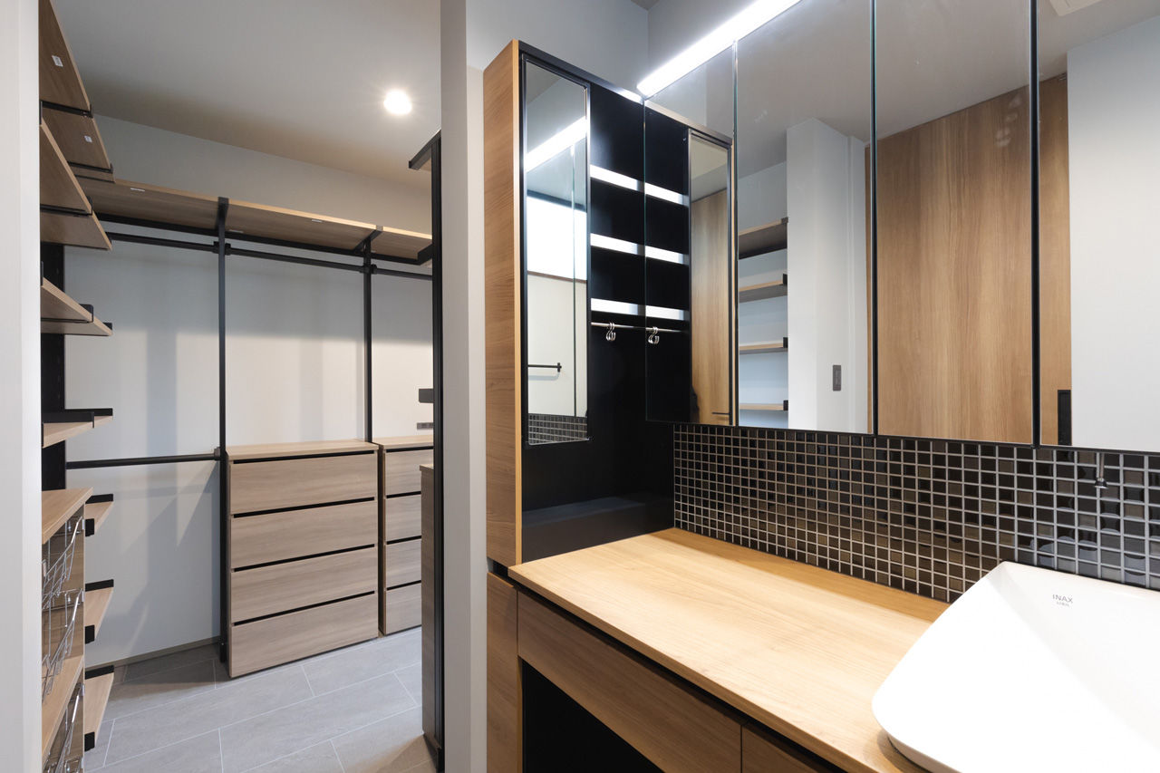 夢広 ６人家族を支える大きなランドリールームが魅力的。スキップフロアでつながる開放的な住まいの建築実例画像9