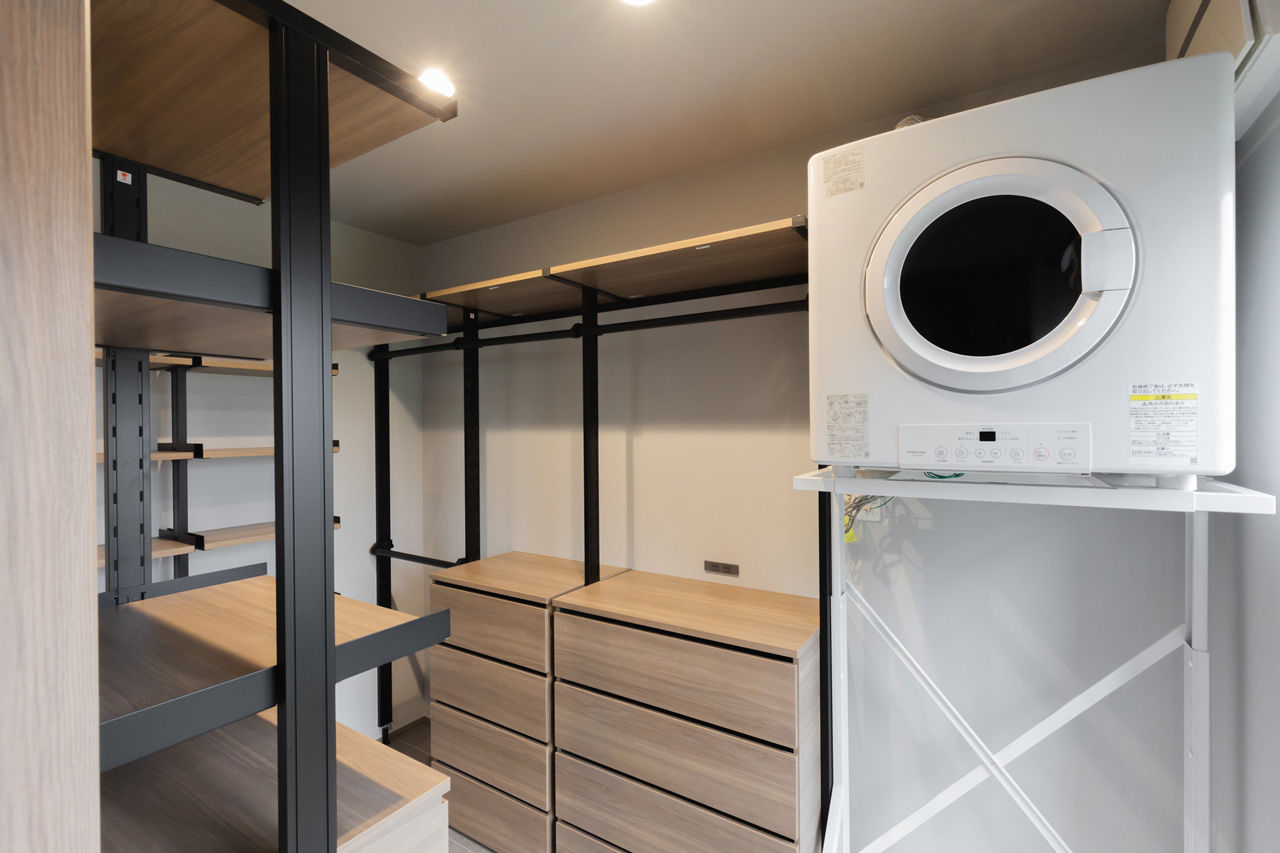 夢広 ６人家族を支える大きなランドリールームが魅力的。スキップフロアでつながる開放的な住まいの建築実例画像10