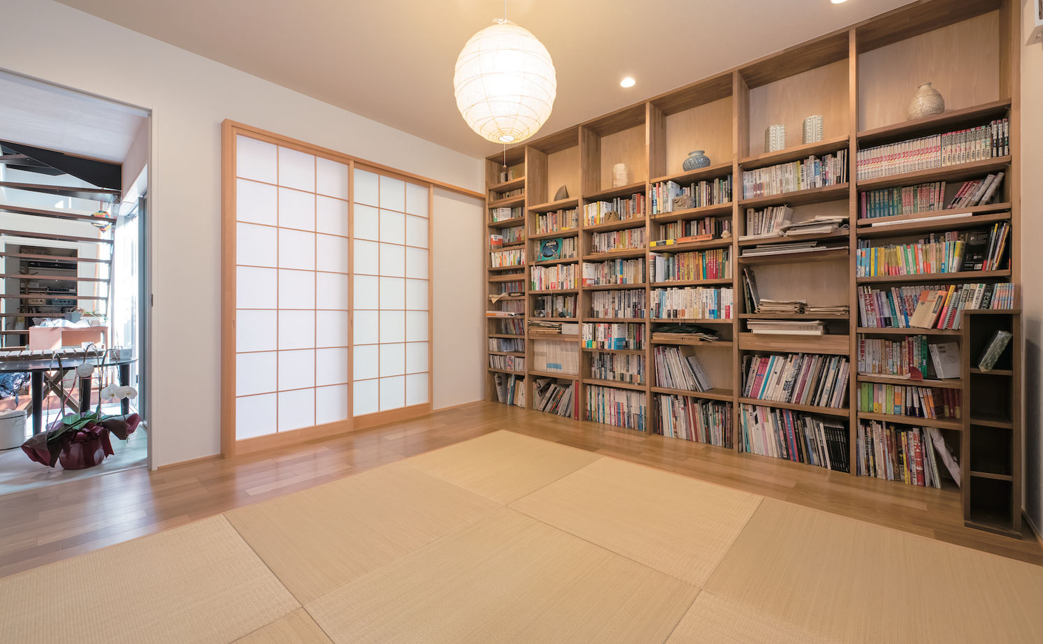 一級建築士事務所　ホームスタイリング 【4500万円/67坪/中庭】住居空間とアトリエのつながりを意識。光と風をが入りこむ、開放的な店舗併用住宅の建築実例画像6