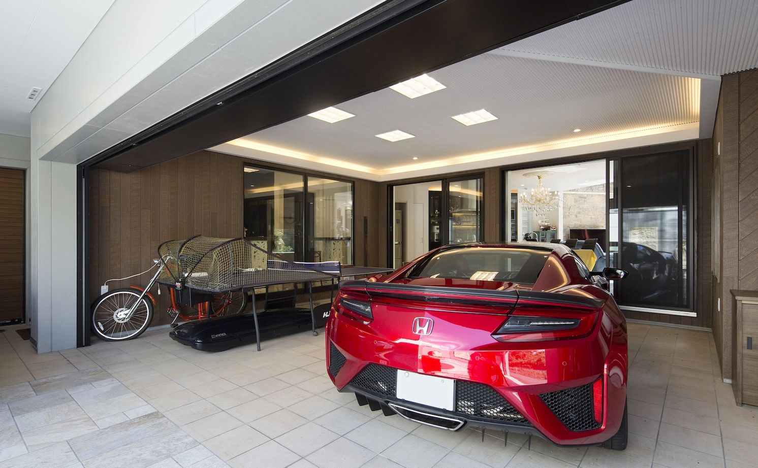 一級建築士事務所　ホームスタイリング 【71坪/間取り図有/吹き抜け/ロフト】リゾートテイストあふれるホテルライクなビルトインガレージのある家の建築実例画像2