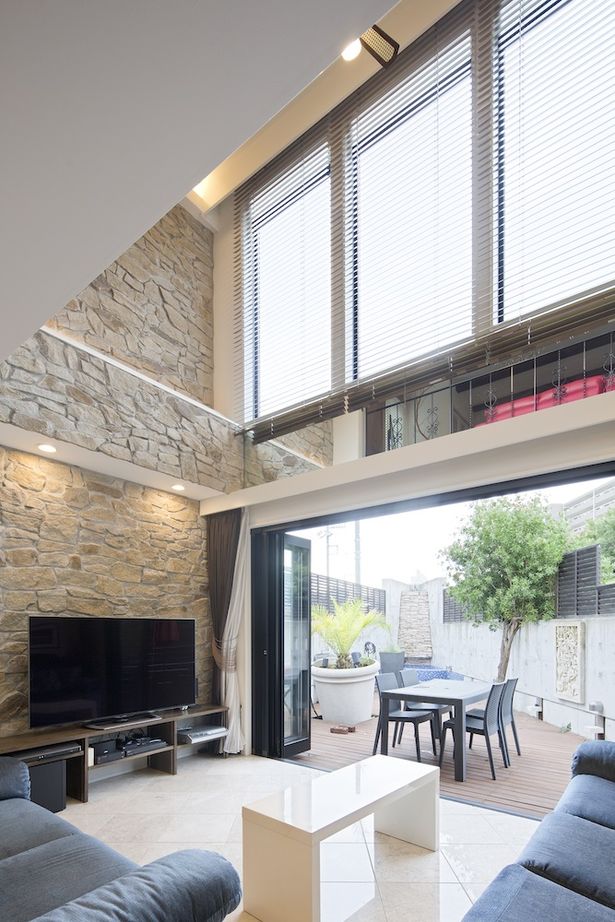 一級建築士事務所　ホームスタイリング 【71坪/間取り図有/吹き抜け/ロフト】リゾートテイストあふれるホテルライクなビルトインガレージのある家の建築実例画像4