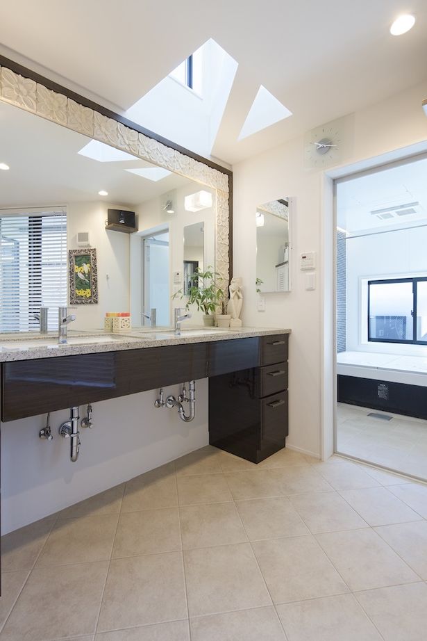 一級建築士事務所　ホームスタイリング 【71坪/間取り図有/吹き抜け/ロフト】リゾートテイストあふれるホテルライクなビルトインガレージのある家の建築実例画像9