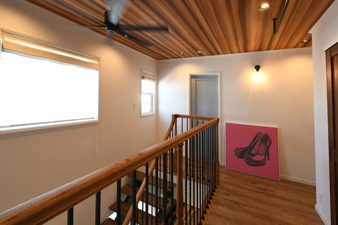 コグマホーム カバードポーチのあるアメリカンな外観が依頼の決め手に。冬でもシャツ1枚で過ごせる快適さにも大満足！の建築実例画像9