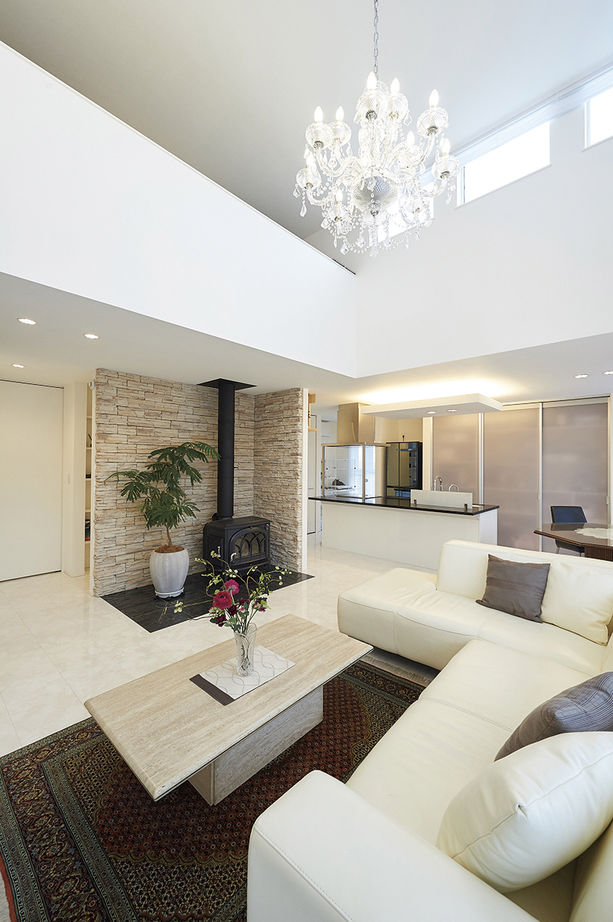 アキュラホーム（AQ Group） 【2000万円台/50坪】こだわりのインナーガレージ、薪ストーブを楽しむLDKを実現。家族が集う平屋の住まいの建築実例画像2