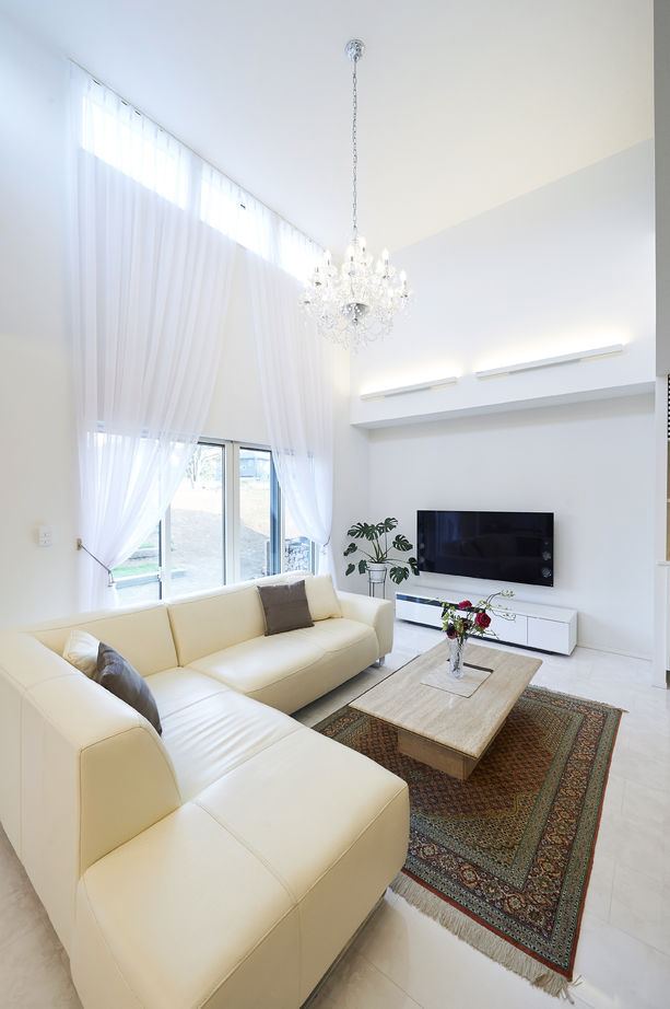 アキュラホーム（AQ Group） 【2000万円台/50坪】こだわりのインナーガレージ、薪ストーブを楽しむLDKを実現。家族が集う平屋の住まいの建築実例画像4