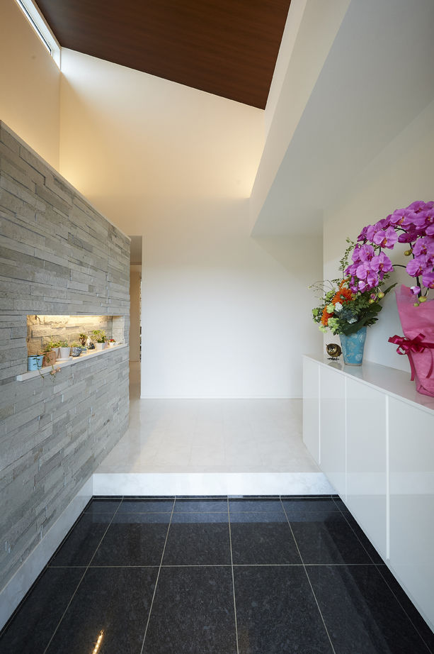 アキュラホーム（AQ Group） 【2000万円台/50坪】こだわりのインナーガレージ、薪ストーブを楽しむLDKを実現。家族が集う平屋の住まいの建築実例画像12