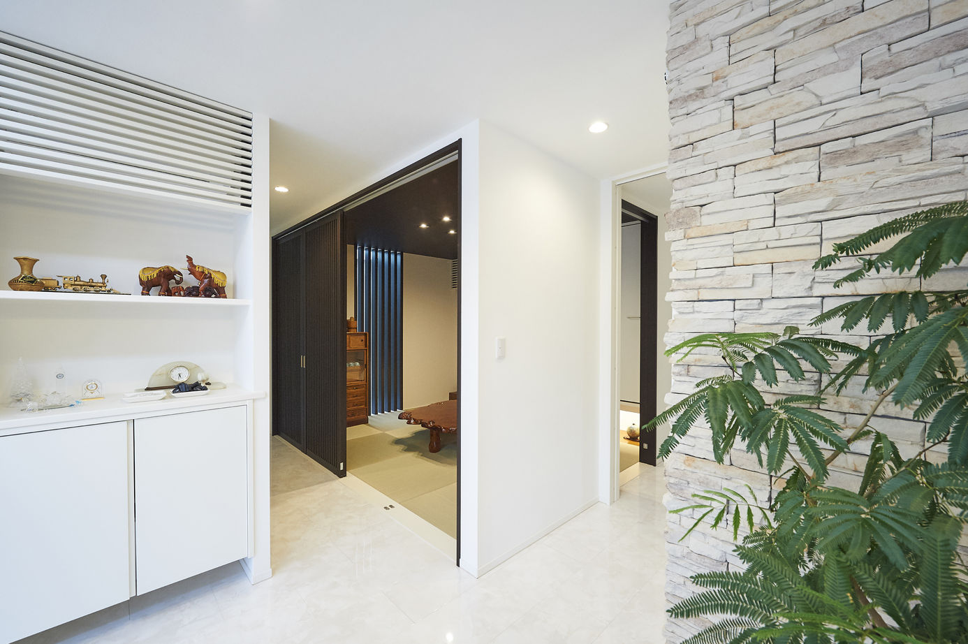 アキュラホーム（AQ Group） 【2000万円台/50坪】こだわりのインナーガレージ、薪ストーブを楽しむLDKを実現。家族が集う平屋の住まいの建築実例画像17