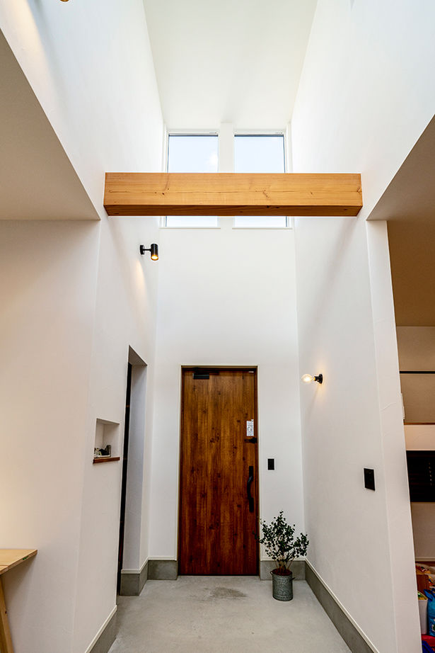 オーパス スタイル 【愛知県/薪ストーブ×吹抜け/30坪台】リビングとひと続きの土間空間が開放感を演出する、離れと調和する家の建築実例画像18