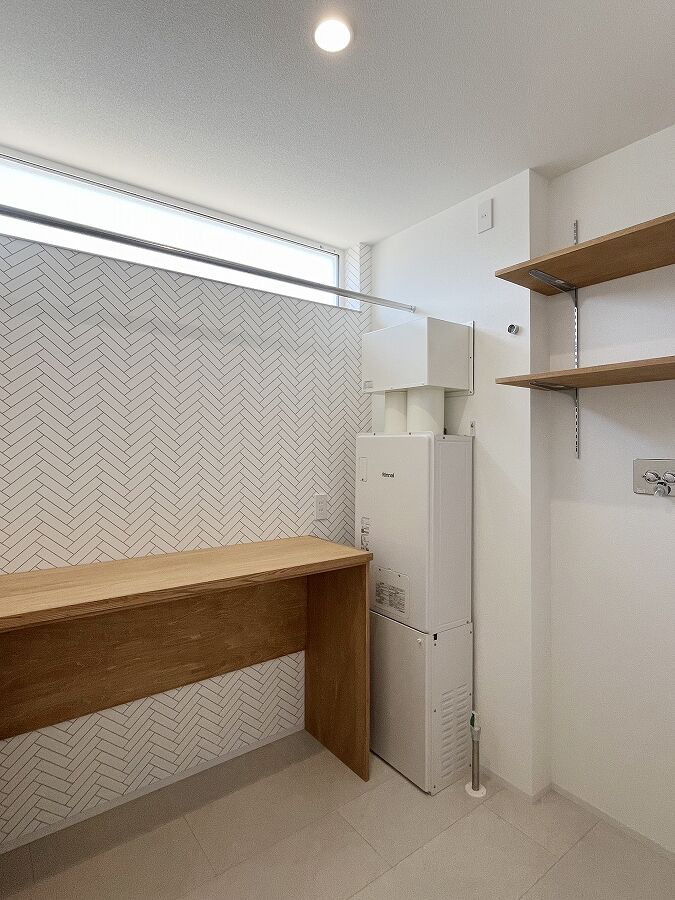 グリートホーム オープンキッチンが主役！質感と動線にこだわったホワイトコーデのお家の建築実例画像7