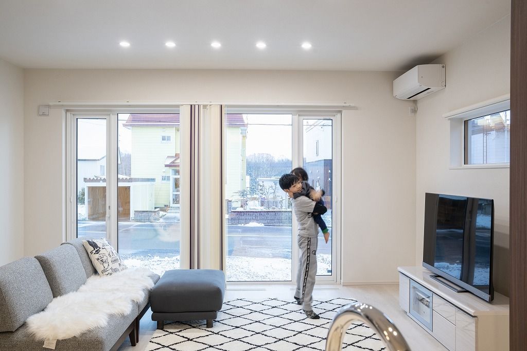 アーキテックプランニング 【2500～3000万円/間取り図有】カラーセレクトにこだわった、建替えで実現した二世帯住宅の建築実例画像1