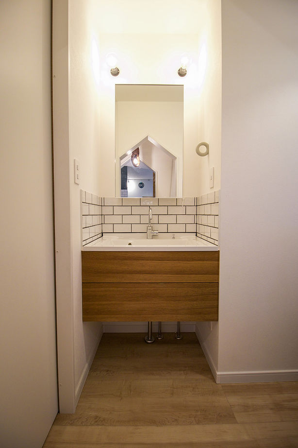 マッケンジーハウス(厚木・平塚・秦野) 【吹抜／回遊動線／傾斜地】蔵のような佇まいの中はオープンでフレキシブル。模様替えを愉しむ住まいの建築実例画像8