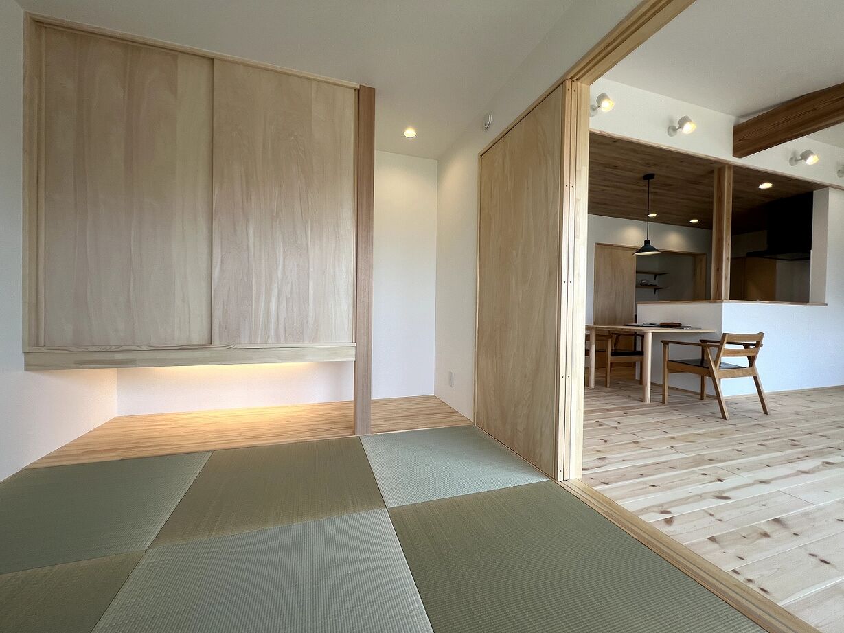 熊木建築事務所 インナーガレージのある、鎧張の平屋の建築実例画像8