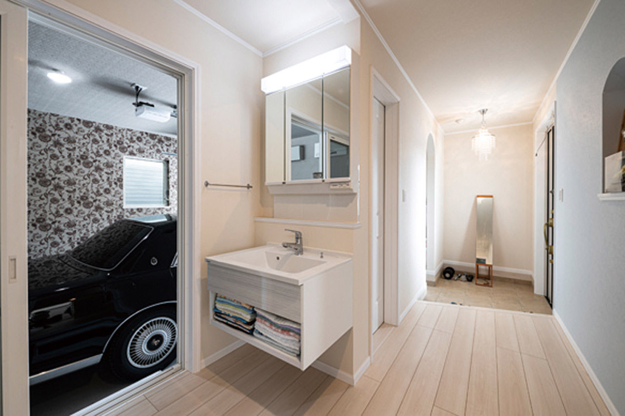 セルコホーム福岡西・宗像（福岡住宅） 明確な見積もりで納得の家づくり、吹抜けと愛車用のインナーガレージを実現の建築実例画像3