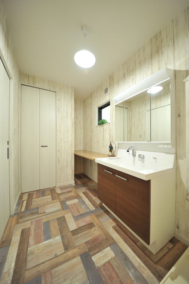 エスクリエイト　 【大阪/1000万円台/延床32坪/間取り図】ヘリンボーンにパーケット、木目がおしゃれ。広いLDKと通り土間の家の建築実例画像10