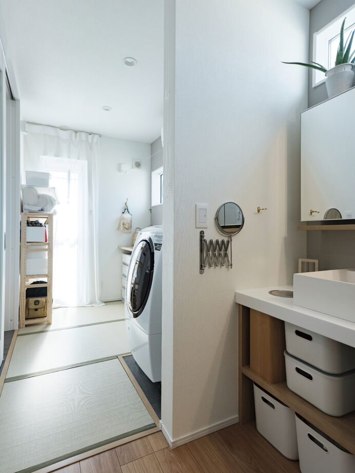 アルネットホーム 【間取り有】ウッドデッキで繋がるコの字型ホワイトハウスの建築実例画像7