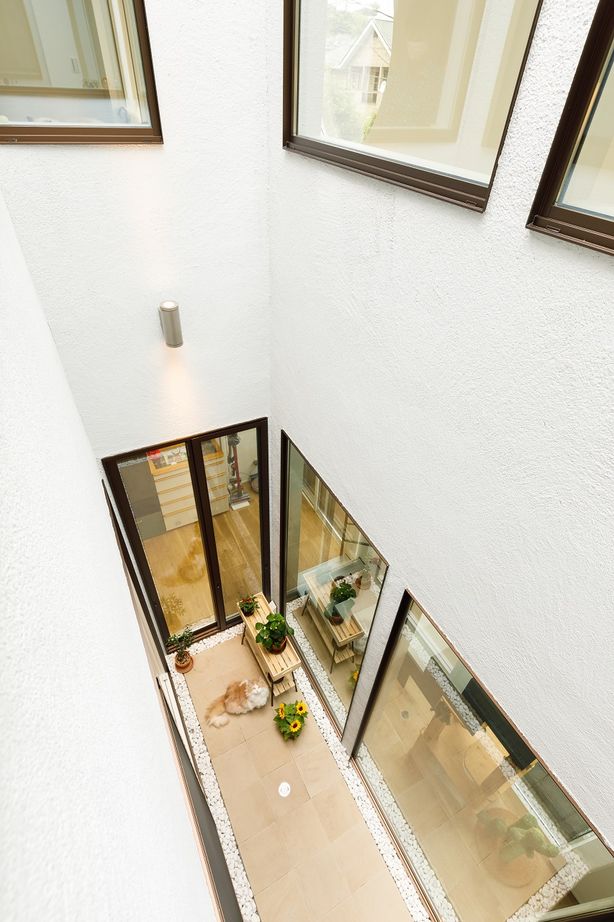 ビクトリーホーム 【2000万円台/キャットドア/バルコニー】猫と暮らす。広いリビングと吹き抜けの中庭がある開放的な注文住宅の建築実例画像6