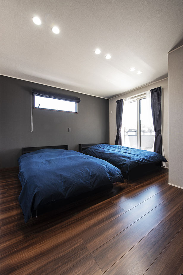 トヨタホーム 【50坪以下/全館空調/家事ラク】主役は愛車を魅せるインナーガレージ。美しい佇まいの中に快適満載の住まいの建築実例画像8