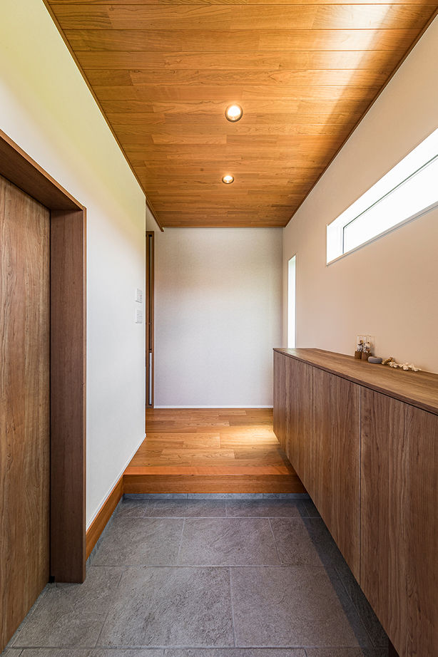 岡本住建 【3000万円台/ビルトインガレージ/薪ストーブ】テクノストラクチャー工法で叶えた26.9帖の大空間LDKの家の建築実例画像9