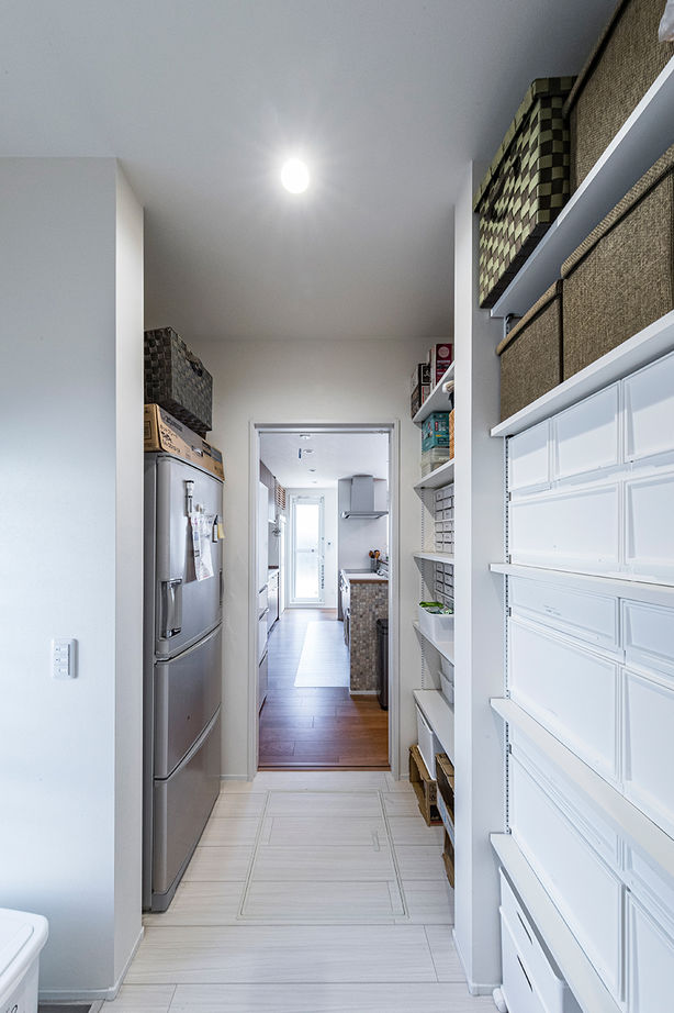 岡本住建 【3000万円台/ビルトインガレージ/薪ストーブ】テクノストラクチャー工法で叶えた26.9帖の大空間LDKの家の建築実例画像10