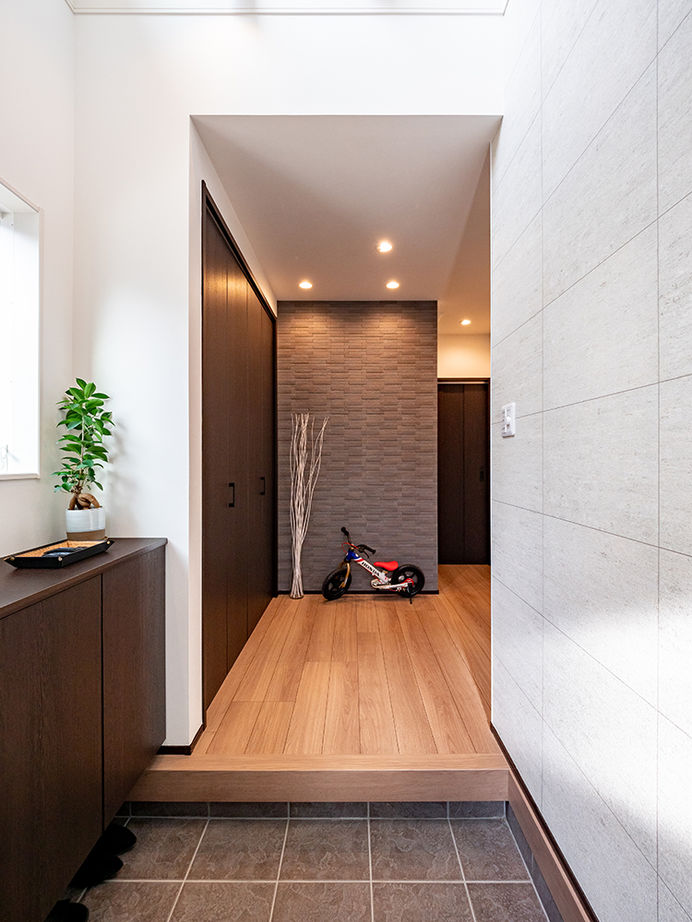 アサヒグローバルホーム 【2000万円台/間取り/40坪台/吹抜け玄関】総タイル張り外観×大空間リビング。「グレードUPしてもお手頃！」の建築実例画像5