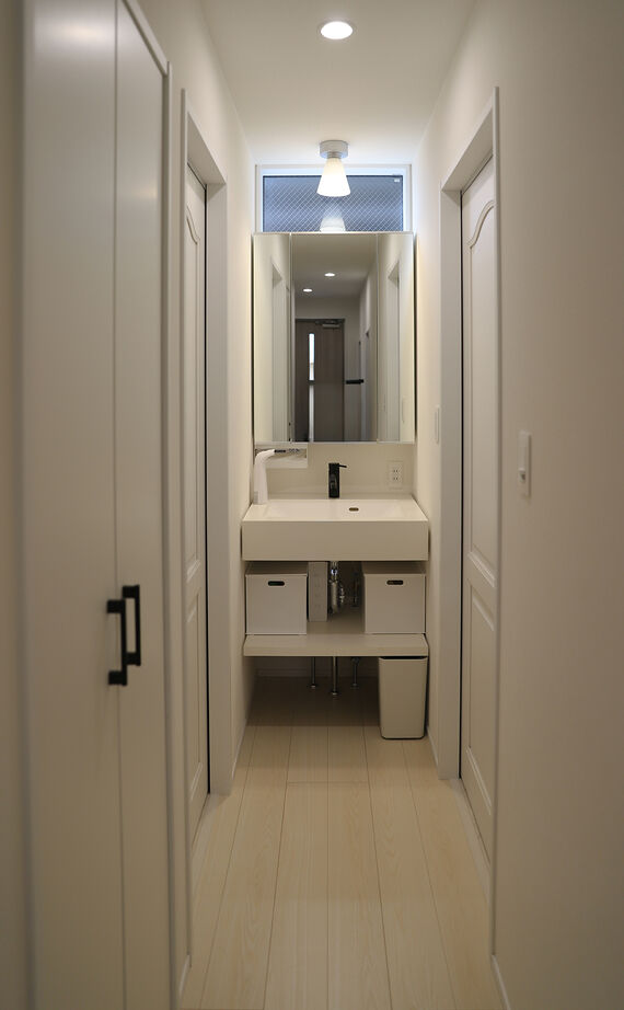 アサヒグローバルホーム 【2000万円台/30坪台/ガレージ/3階建て】狭小地に建てた3階建てビルドインガレージ住宅の建築実例画像4