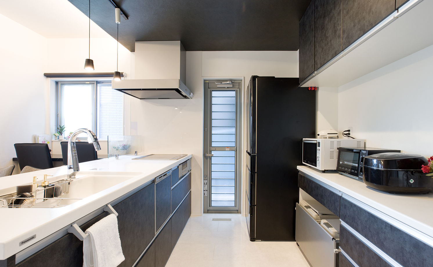 アサヒグローバルホーム 【1000万円台/間取り/約40坪/グレイッシュ外観/土間】南向きの広いリビング×折り上げ天井で開放感抜群の家の建築実例画像12