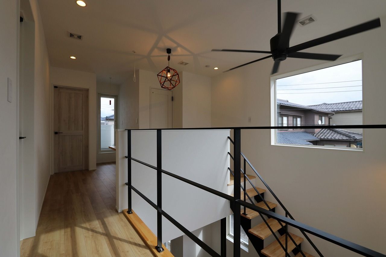 光英住宅 一体感あるLDKの大空間+伸びやかな吹き抜けが気持ちいい家の建築実例画像3