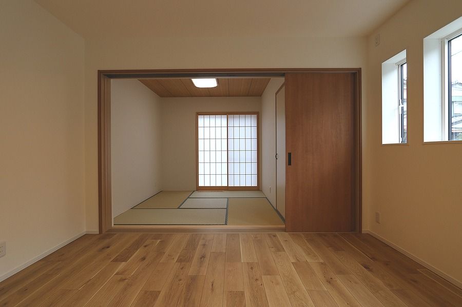 光英住宅 外張り断熱と内断熱のW断熱で一年中快適。クールな雰囲気をまとうインナーガレージのある家の建築実例画像3