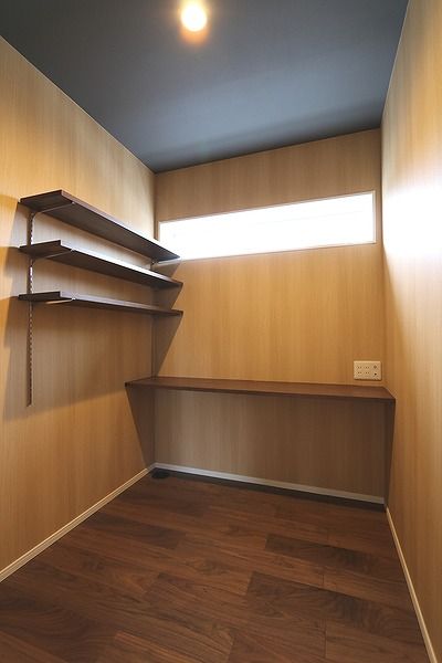 光英住宅 外張り断熱と内断熱のW断熱で一年中快適。クールな雰囲気をまとうインナーガレージのある家の建築実例画像7