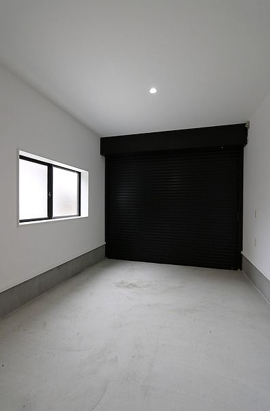 光英住宅 外張り断熱と内断熱のW断熱で一年中快適。クールな雰囲気をまとうインナーガレージのある家の建築実例画像9