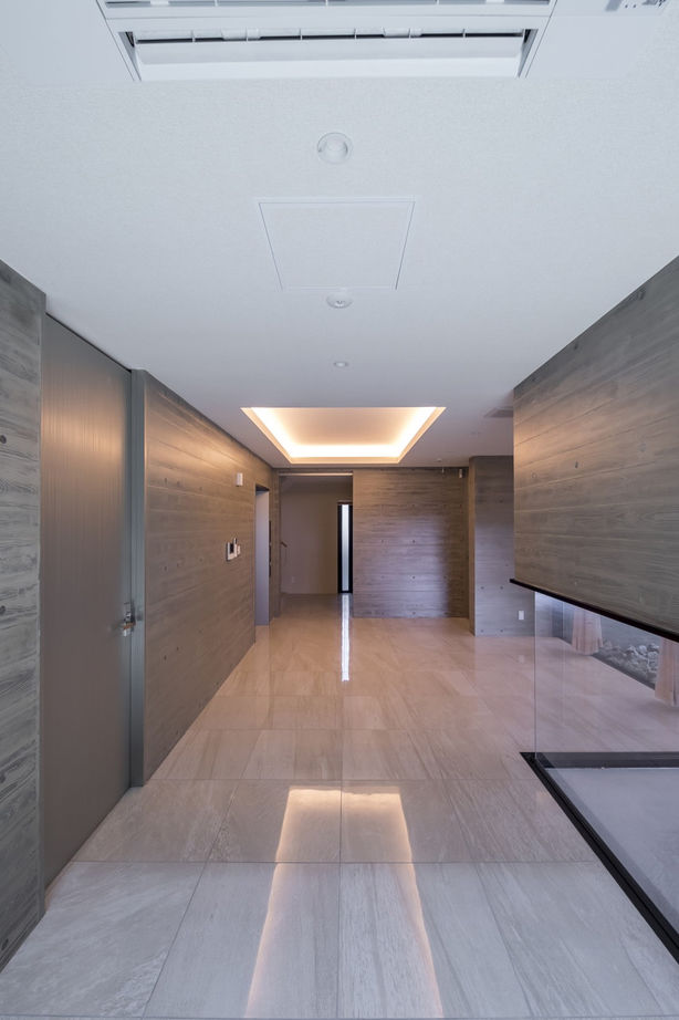 愛三 ホームパーティを満喫できるRC3階建て。重厚な打ちっぱなしコンクリートの外観×ラグジュアリーな住空間の建築実例画像8