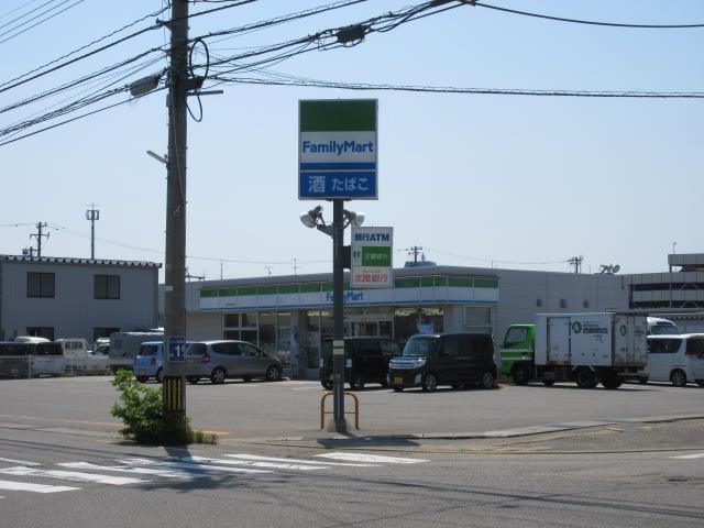 コンビニ　ファミリーマート金沢無量寺店（コンビニ）まで407m