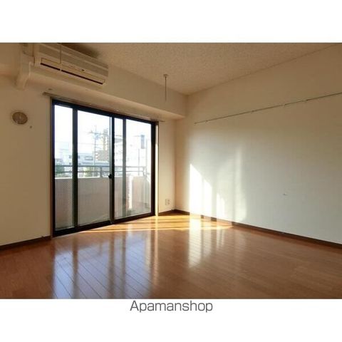 ベルカント相模大野の居間写真