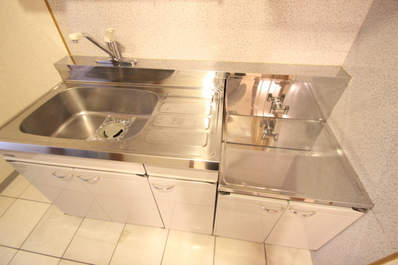 キッチン　※別部屋の写真です。実際とは異なる場合がございます。