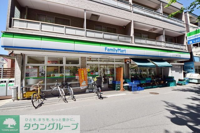 コンビニ　ファミリーマートまるいし祖師谷店（コンビニ）まで410m