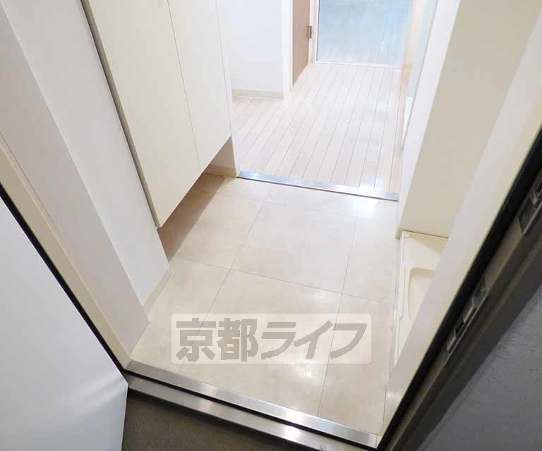 阪急京都線 西院駅 徒歩9分 11階建 築21年の玄関写真