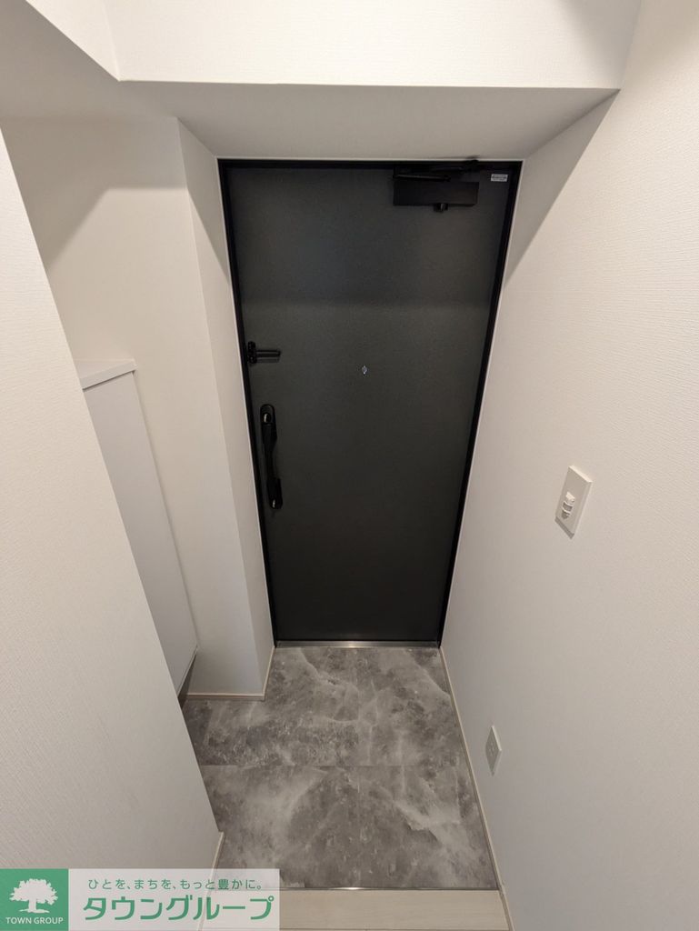 タスキsmart春日の玄関写真